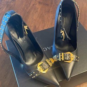 Women's Versace studded belt ankle strap heels.